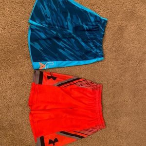 Lightly worn Under Armor shorts both size Youth Medium sold as set